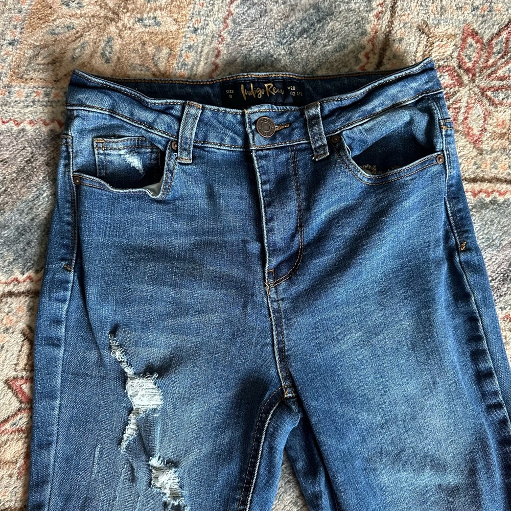 Women's Distressed Blue Jeans